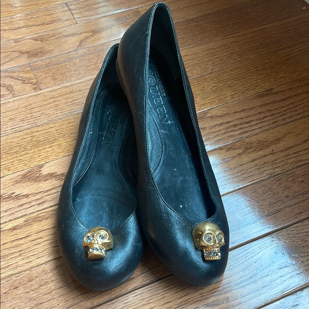 Alexander McQueen Black Flats with Gold Skull Detail